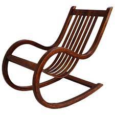 umber rocker modern low rocking chair in walnut with crafted arm detail in 2021 rocking chair modern rocking chair wood rocking chair