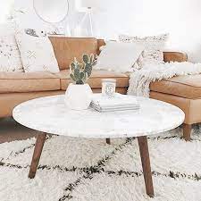 This drum coffee table is sure to bring a breezy, boho feel into your living room, instantly. How To Style A Chic Coffee Table