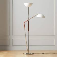 Materials are brushed brass and acrylic. Pavo Champagne Brass Double Floor Lamp Reviews Cb2