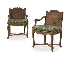 Date Unspecified A Pair Of Regence Walnut And Beechwood Caned Fauteuils Early 18th Century Price Realised Usd 1 875 Furniture Curved Chair Sofas And Chairs