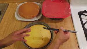 When the cake is loose, turn the pan upside down and gently ease the cake out and onto the cooling rack or plate. How To Get Cake Out Of Pan Youtube