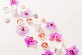 Essentially you are creating layers of wax with fresh flower petals mixed in. Burning Candles And Orchid Flowers On Wooden Background Relaxation Spa Concept Top View Stock Images Page Everypixel