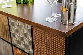 We specialize in the creation of custom copper counter tops. Bespoke Bars Peppermill Interiors