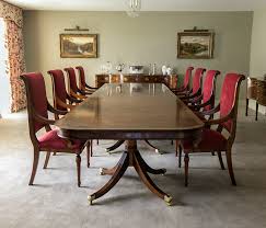 Solid mahogany dining room chairs with simple splats, a classic dining chair. Mahogany Dining Tables Titchmarsh Goodwin