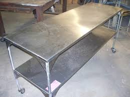 Built from heavy steel plate and flatbar. Stainless Steel Table Eagle Welding Services Inc
