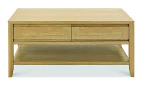 Far from being just another piece of furniture, coffee tables often feature prominently in a room's layout, making it that much more important to consider the appearance of the piece. Bentley Designs Bergen Oak Coffee Table With Drawer 8101 05 At Relax Sofas And Beds