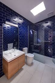 In the shower corner, you can see the multicolored ceramic tiles. 25 Blue Bathrooms That Really Inspire Shelterness