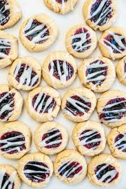 Used homemade red and black current jam and it is amazing. Best Almond Thumbprint Cookies A Couple Cooks