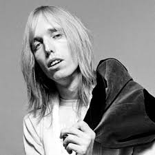 Years after a major global conflict has left the united states in dystopian disarray, a nomadic traveler who becomes known as the postman (kevin costner) wanders through towns in the northwest. Remembering Tom Petty S Quirky Roles In The Postman And King Of The Hill Vanity Fair