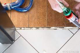 How To Make Your Own Threshold Piece For Wood Flooring From Leftovers Diy Flooring Tile To Wood Transition Diy Wood Floors