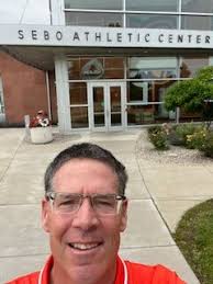 Mark Malcolm, E.M., C.