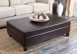 With futons, you just have to push back the cushion and frame to lay it flat. Brown Leather Ottomans Storage Coffee Table Etc