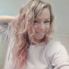 What are some recommendations for a tailor in Costa Mesa to take in denim  jeans?