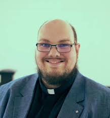 The Reverend David Elias in Saint David's Church, presiding over our  marriage in 1980.