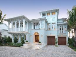 It sits in the middle of a field and has very little vegetation around it. Caribbean Exterior Paint Schemes How To Choose Exterior Paint Colors Seaside Design Best Exterior Paint Finishes For Your Home Blog Artefak Kuno