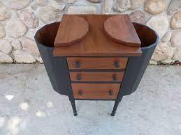 The finish of the mahogany sewing stand still exudes warmth. Martha Washington Sewing Cabinet Reloved Hometalk