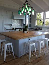 Check spelling or type a new query. Kitchen With Wooden Island Table Oversized Kitchen Islands Are The Peak Of Chic In Southern Kitchen De Cocinas Muebles De Cocina Rusticos Decoracion De Cocina