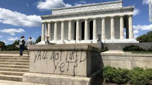 In this temple, as in the hearts of the people for whom he saved the union, the memory of abraham lincoln is enshrined forever. beneath these words, the 16th president of the united states sits immortalized in marble as an enduring symbol of unity, strength, and wisdom. Dc Protests Famed Monuments Defaced After Night Of Unrest Cnnpolitics