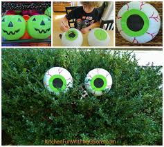 Dollar Store Spooky Bush Eyes Outdoor Craft Cheap Easy Halloween Hacks Clever Halloween Halloween Decorations To Make