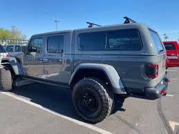 Camper shells, news, truck history. Jeep Gladiator Truck Cap Topper New Toppers Emery S Topper Sales Inc