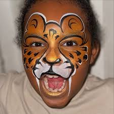 Sparklyy Face Painting added a...