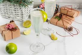 Champagne cocktail recipes 2018 new years drink ideas Ideas For Christmas And New Year Drinks Champagne Margarita Cocktails Garnished With Lime And Salt On White Table With Xmas Decorations Copy Space Stock Photo Picture And Royalty Free Image Image 90567454