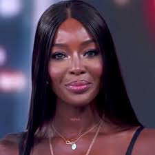 Naomi Touch Her Dress