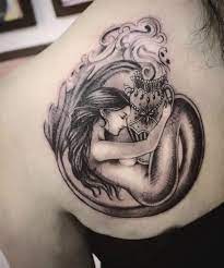 Aquarius Tattoo Designs Which Are Modern And Futuristic Aquarius Tattoo Aquarius Tattoos Shoulder Blade Tattoo