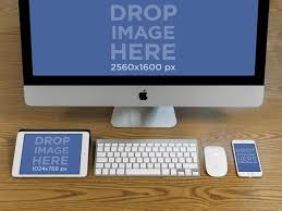 Placeit Iphone Ipad Mini And Imac Mockup Over Wooden Desk Imac Ipad Mini Ipad