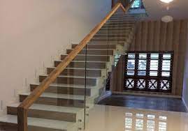 Cantilever staircase with cable railing. The Best Glass Staircase Designs In Kerala Team Contracts
