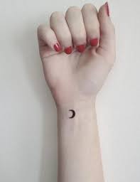Small Black Crescent Moon Tattoo On Hand For Girls Cool Wrist Tattoos Wrist Tattoos Girls Cool Small Tattoos