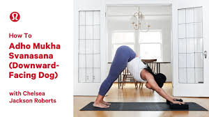 Curl your toes under and push back through your hands to lift your hips and straighten your legs. How To Adho Mukha Svanasana Downward Facing Dog With Chelsea Jackson Roberts Youtube