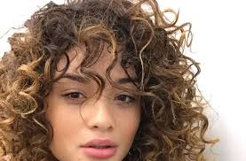 The sides are buzzed off for a rough and edgy look while the long fringe goes to show that you know how to take care of your appearance. Curly Hair With Bangs Galhairs
