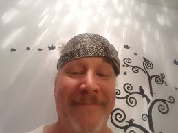 Repurposing a guitar strap as a headband