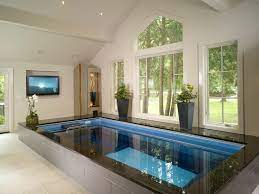 Building a pool house costs anywhere from $160 to $600 per square foot. Pool Beautiful Design Indoor Pool House White Color Dominant About Indoor Pool House And Big Small Indoor Pool Indoor Swimming Pool Design Indoor Pool House