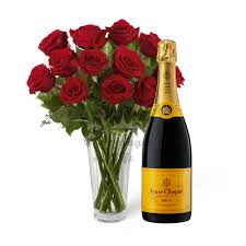 Express your deepest condolences for the dearly departed with our large selection of reasonably priced, tastefully designed, urn flower arrangements. Long Stem Red Roses With Premium Champagne Art Among The Flowers Palm Coast Florist Same Day Local Flower Delivery
