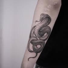 Black And Grey Forearm Tattoo Ideas Black And Grey Snake Tattoo Design On Forearm By Tattooer Intat Snake Tattoo Design Cobra Tattoo Tattoo Designs