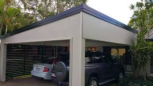 This single carport is free standing, i.e., it is not attached to any other structure. Modern Flat Roof Rendered Carport Brisbane Qld Pro Installation