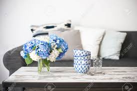 Столик для кофе мебель мадрид интервью дизайн домашний декор. Bouquet Of Hortensia Flowers And Glass Bowls On Modern Wooden Stock Photo Picture And Royalty Free Image Image 43524422