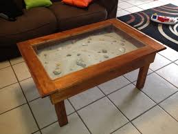 A Coffee Table Display Cabinet Filled With Sea Sand And Shells Display Coffee Table Diy Beach Decor Diy Coffee Table