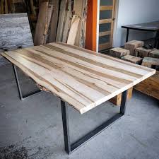 If you do use solid timber one solution for using a plywood table top is to make it look like individual board glued together. Ambrosia Maple Dining Table By Barnboardstore This Is A Clear Coated Top On Industrial Look Steel U Legs Maple Dining Table Maple Furniture Furniture