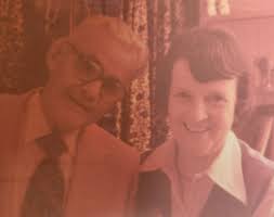 It would be amazing if one of you super talented people could sharpen this  photo up and restore the colour of the car to its original bright red  please. The colour has