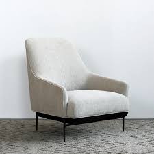 design by 365º norththe chill high back chair is inspired by a pure and minimalist swivel chair living room blue chairs living room leather chaise lounge chair