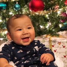 Christmas, lights, tangled, infant, Santa, presents, Christmas tree by corey  pittman. Photo stock