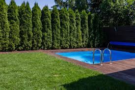 Your backyard can be hard to enjoy when you feel like the neighbors are watching. 16 Pool Fence Ideas That Will Upgrade Your Yard