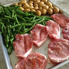 Roasted boneless center cut pork chops with red winethebossykitchen.com. Baked Thin Pork Chops And Veggies Sheet Pan Dinner Eat At Home