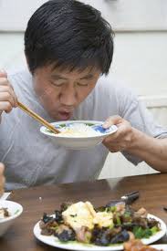 This behavior also belongs to the behavior of lack of upbringing, making others feel offensive. Man Eating From A Bowl Of Rice Using Chopsticks Stock Image C046 6106 Science Photo Library