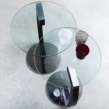 This table is made using curved glass, clear or lacquered black. Zen Coffee Tables Cattelan Italia