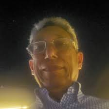 A 62-year-old man presents with progressive jaundice, unintentional weight  loss, and dark urine. He denies pain. On exam, he has scleral icterus and a  palpable, non-tender gallbladder.CT Abdomen shown below