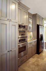 The wall color, artwork and furniture all work together to create a space that feels organic and warm. Kitchen Cabinets Or Bathroom Vanities Showplace Cabinetry